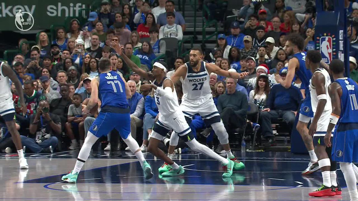 Luka Doncic went back to the locker room after an apparent injury on this play.