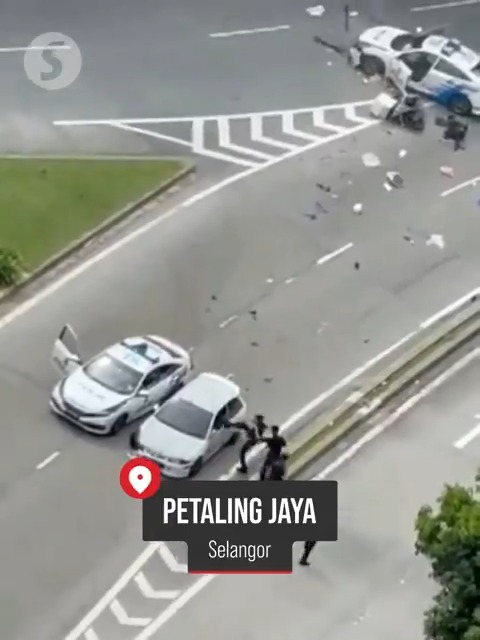 Two male suspects were arrested after a high-speed chase on the LDP on Dec 26 , during which they drove against traffic and collided with a police car and motorcycle before being stopped.