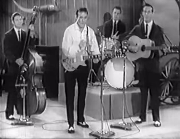 The “King of Rockabilly,” Carl Perkins, took his self-penned “Blue Suede Shoes” to #3 on the Billboard R&amp;B chart. Not long after, Elvis took it to #1. “Blue Suede Shoes” is now considered by many to be one of the first rock anthems.