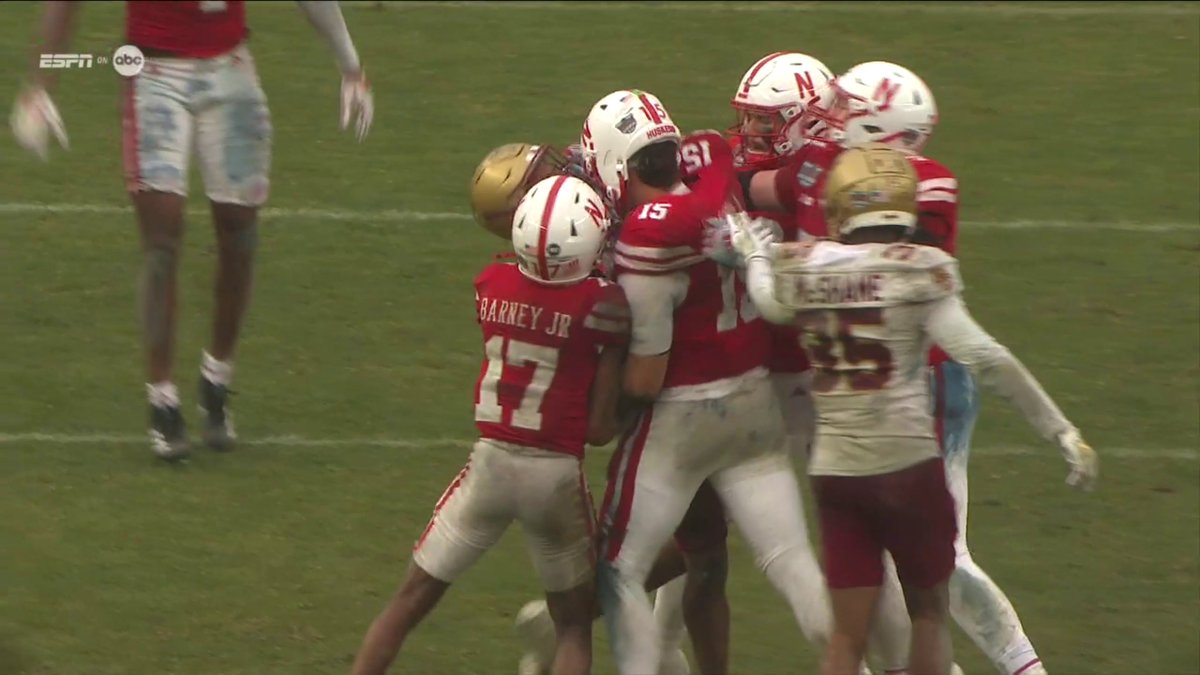 Players had to be separated after this hit on Nebraska QB Dylan Raiola. Boston College was given a personal foul penalty for a late hit on the play.