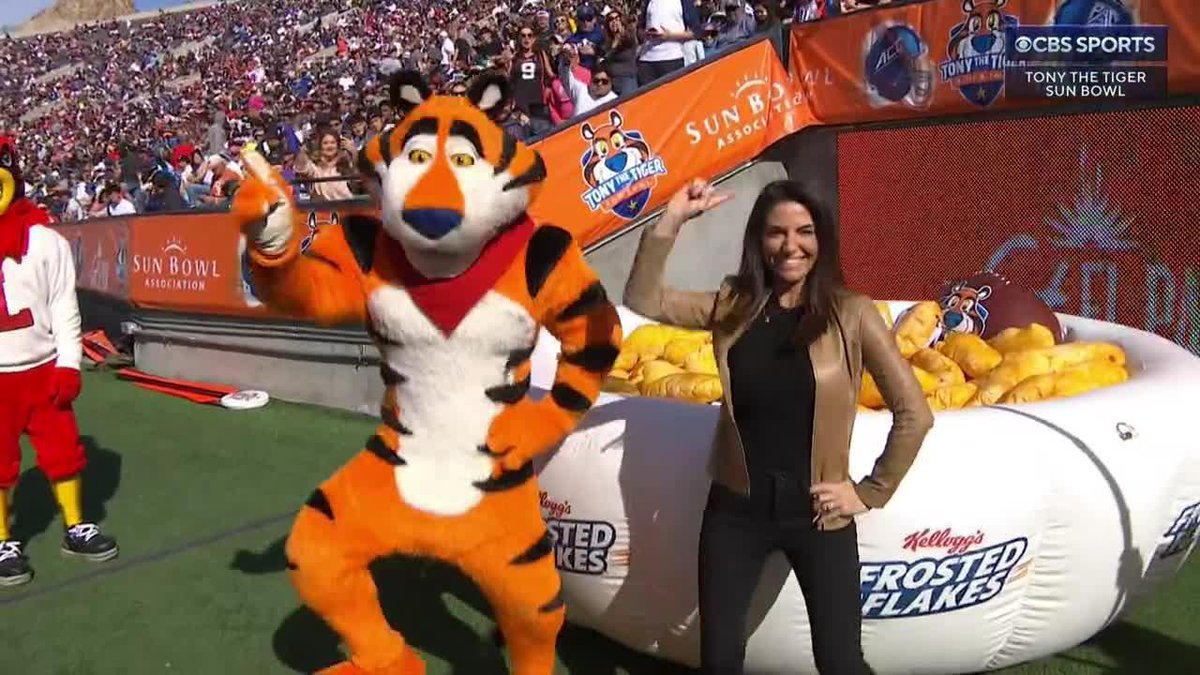 Tony the Tiger and Jenny Dell showing off the dance moves at the Tony The Tiger Sun Bowl 😂