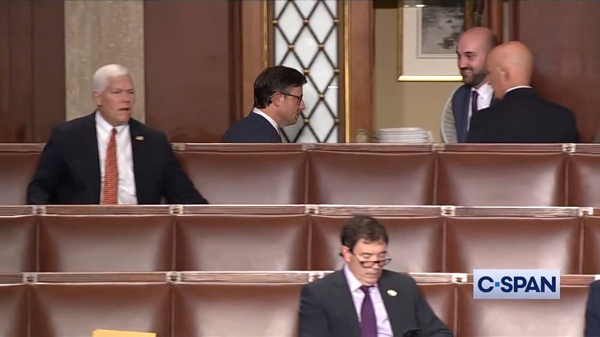 Rep. Mike Johnson (R-LA) leaves the floor with Rep. Keith Self (R-TX), who voted for Rep. Byron Donalds (R-FL) for Speaker on the first ballot.