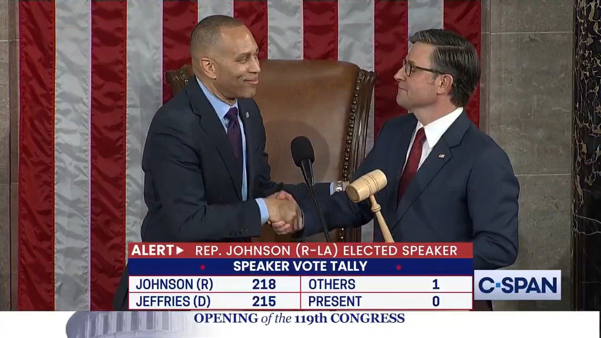 .Hakeem Jeffries presents the gavel to Speaker Mike Johnson.
