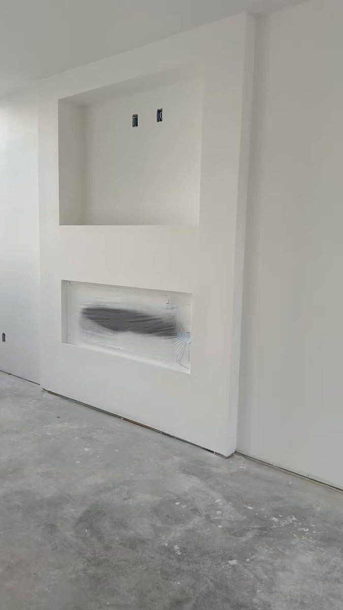 Finishing up some incredible Level 5 drywall details. If you can guess the color of this white, I will build you a house!