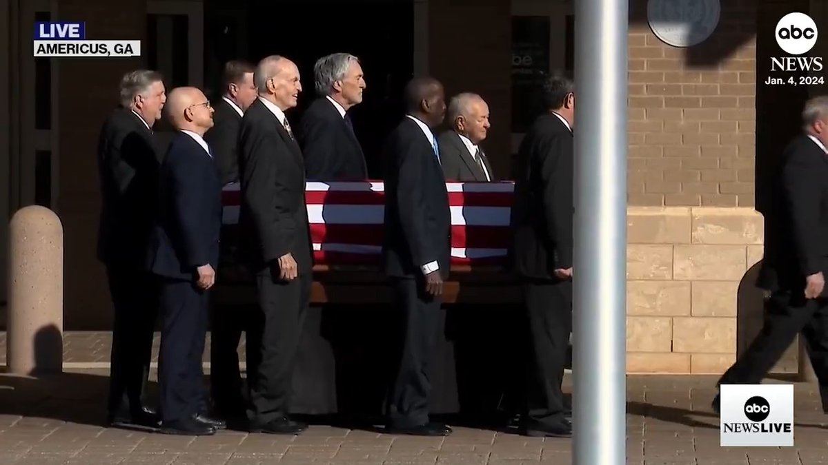 The casket of former President Jimmy Carter is transferred from his hometown of Plains, Georgia, to Atlanta, where a service will be held at the Carter Presidential Center. The former president died on Dec. 29 at the age of 100.