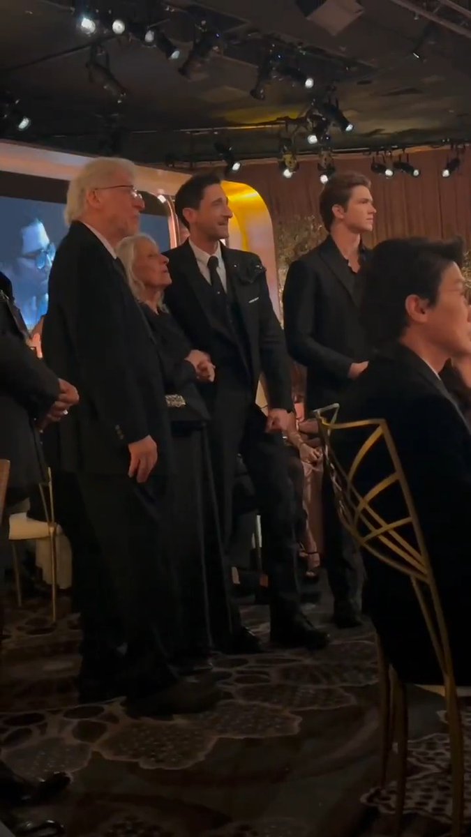 Adrien Brody celebrates his best actor #GoldenGlobe win with his parents, and reacts to the announcement that #TheBrutalist won best picture - drama