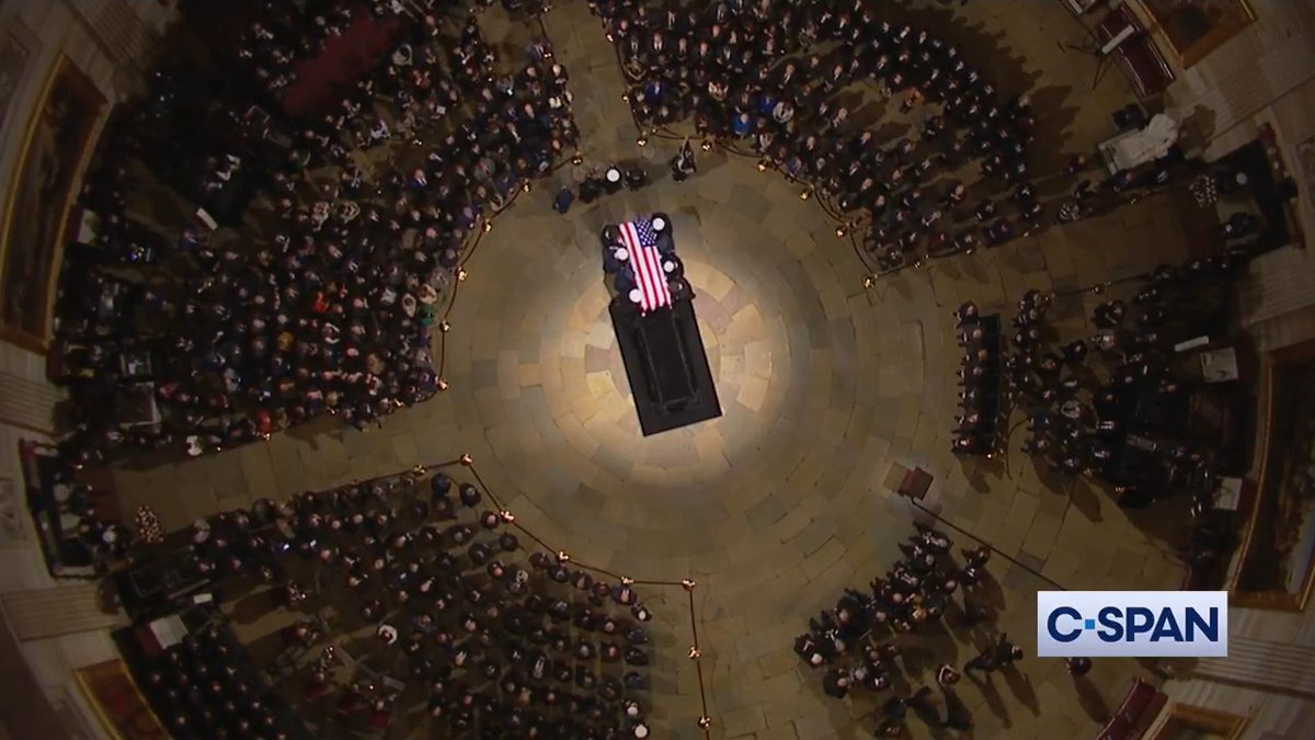 President Jimmy Carter's casket arrives in the U.S. Capitol Rotunda.