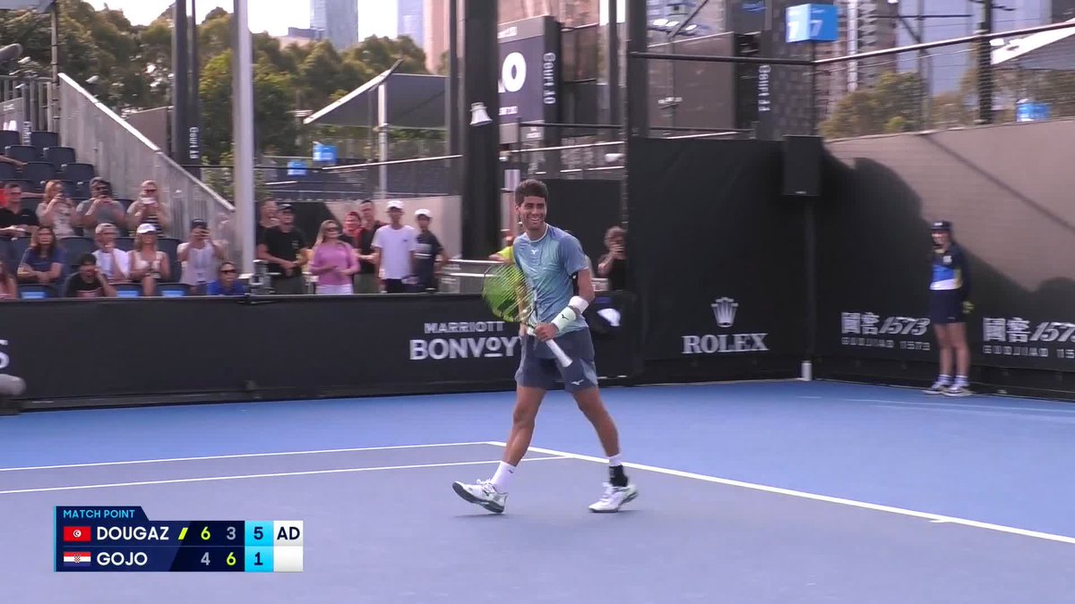 Delight for Dougaz 🇹🇳 Aziz Dougaz wins against Borna Gojo 6-4, 3-6, 6-1 to power into a maiden Grand Slam main draw! 🔋 #AO2025