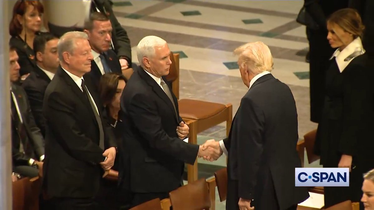 President-elect Trump shakes hands with former Vice Presidents Al Gore and Mike Pence.