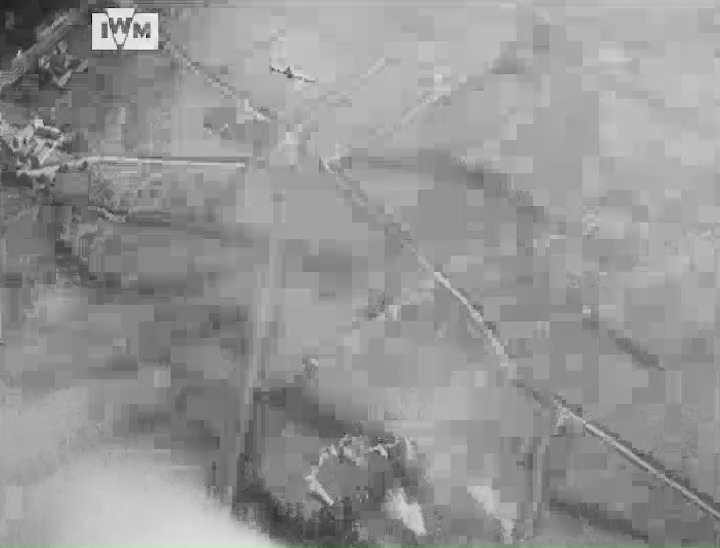 A Hawker Typhoon fires its rockets at a railway, July 1944. Film: IWM MTE 1829 <1/2>