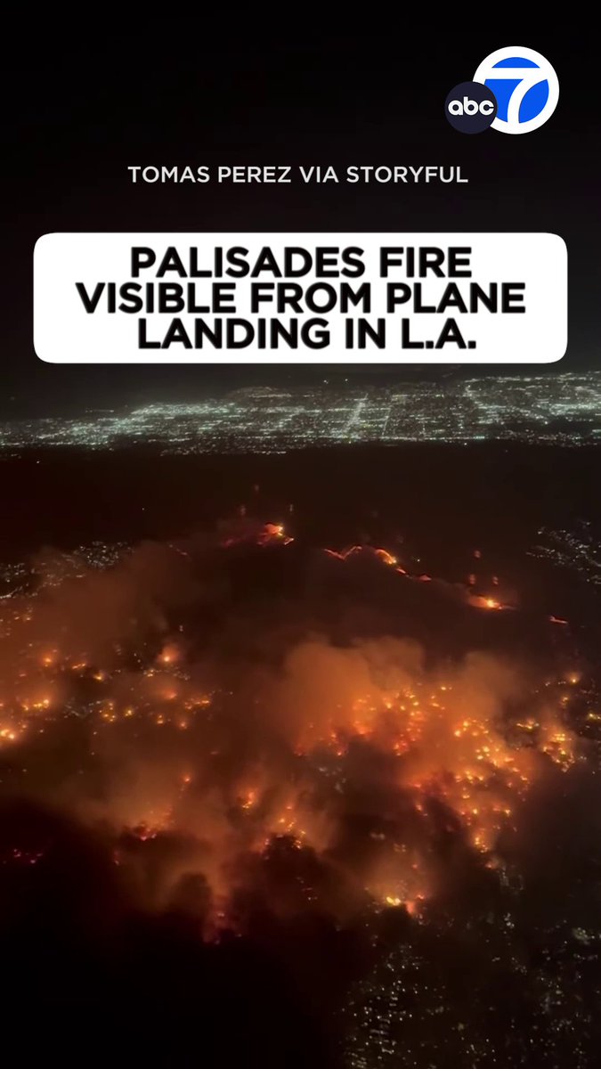 A plane landing at LAX airport in Los Angeles had a full view of the raging Palisades Fire against the backdrop of the dark night sky. A passenger is heard saying, "It’s like there’s lava everywhere." 💔