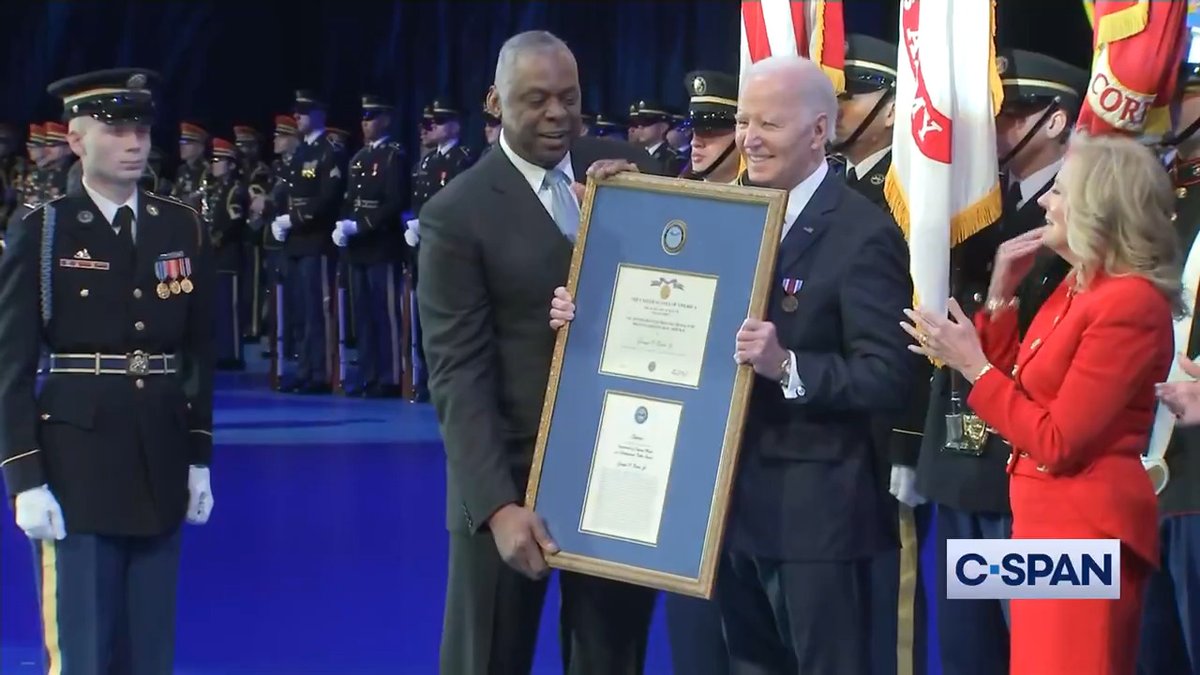 President Biden receives the Distinguished Public Service Medal.