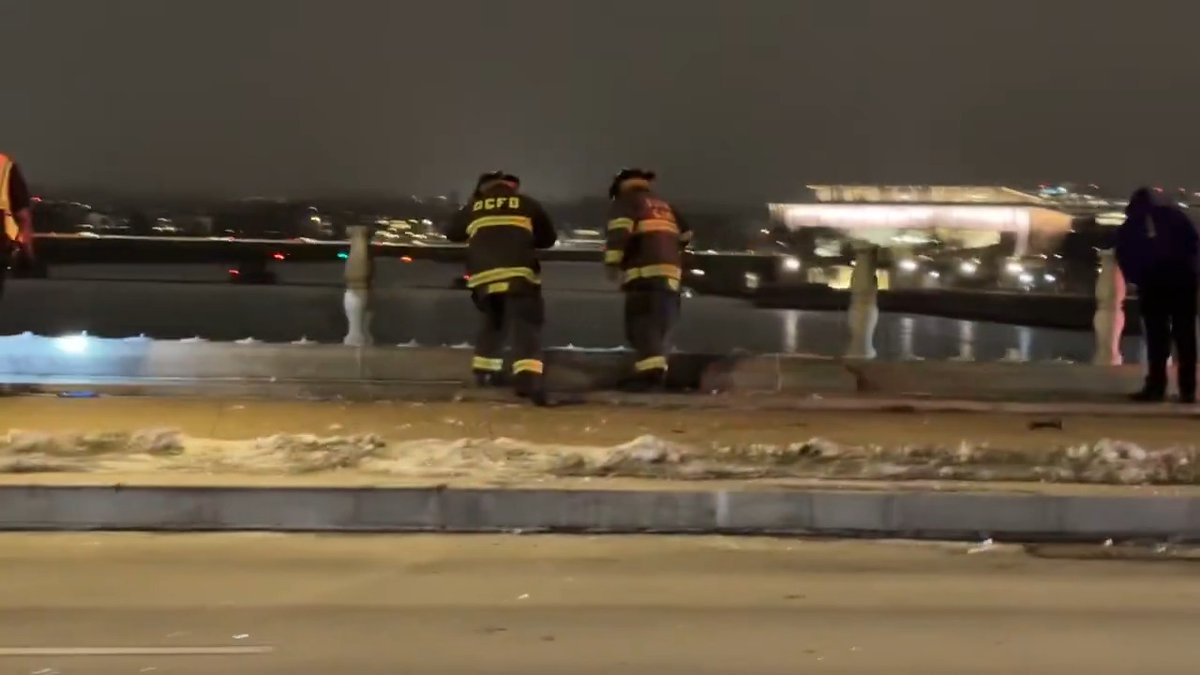 Several cars just went over the bridge into the water in Washington DC