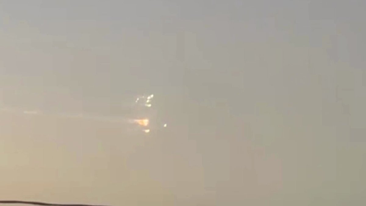 A SpaceX Starship prototype broke up in space minutes after launching from Texas. The fiery aftermath is seen from Haiti