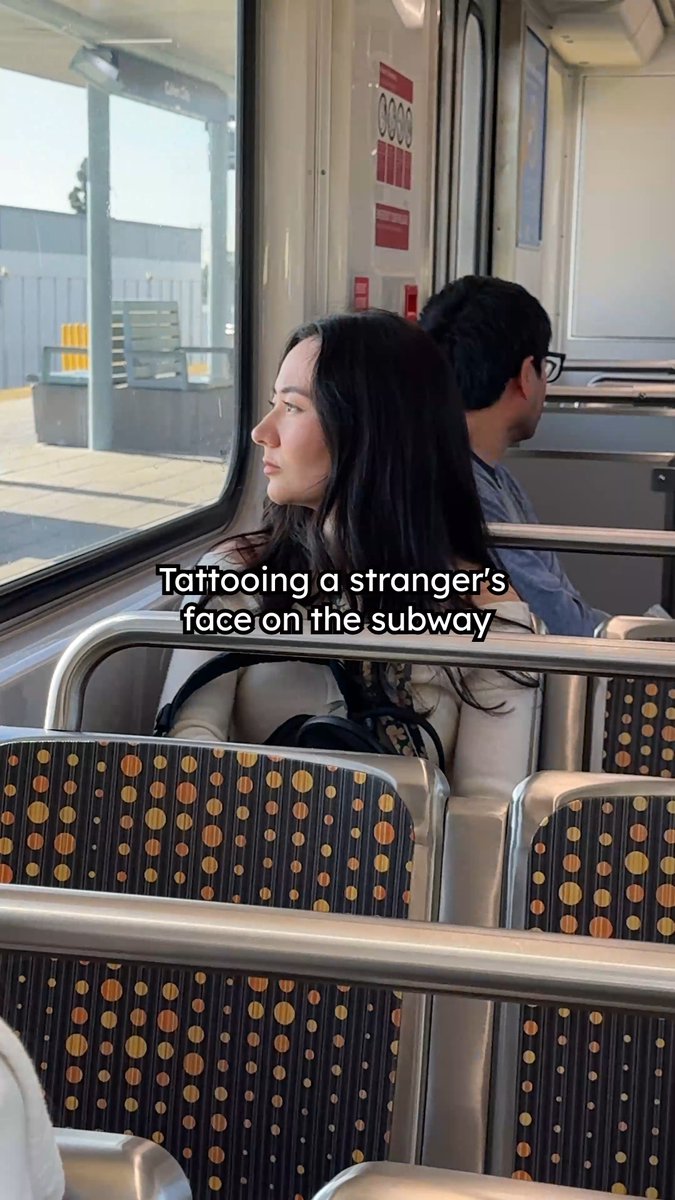 Tattooing a stranger's face on the subway
