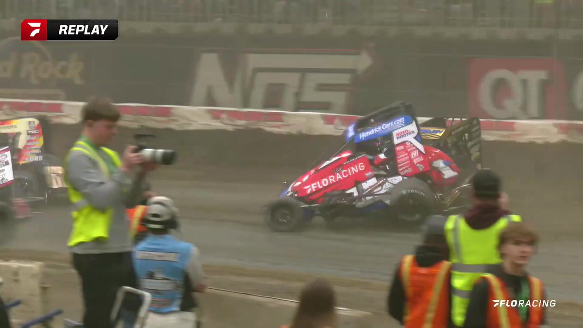 💥 Chaos in lap traffic and leader Kyle Larson gets involved but keeps goin!!! Is his car ok!? #ChiliBowl powered by NOS Energy Drink
