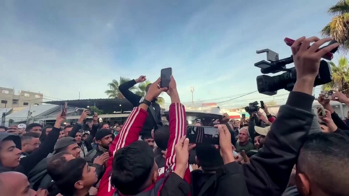 Gazans celebrated as a delayed ceasefire between Israel and Hamas took effect
