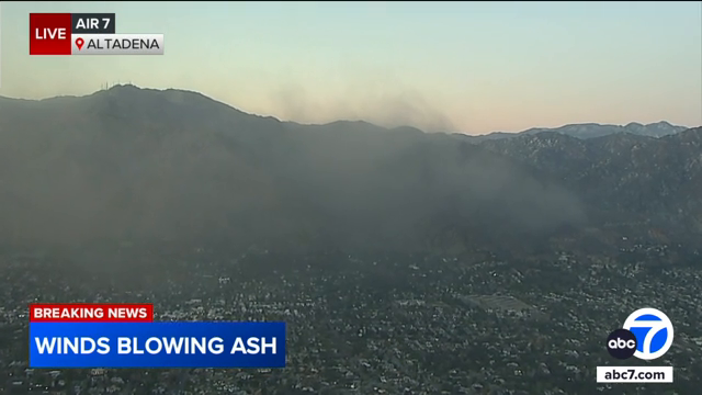 Strong winds appeared to be blowing ash from the Eaton Fire over communities near Sierra Madre, helicopter reporter Gabe Santos reported. Residents are advised to stay indoors if possible and wear a mask when outdoors.