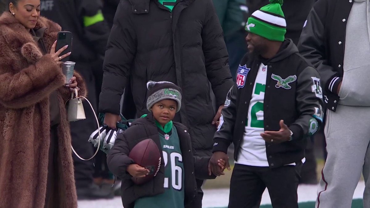 Lifelong Philadelphia Eagles fan Kevin Hart and his son on the field before the NFC Championship. #FlyEaglesFly