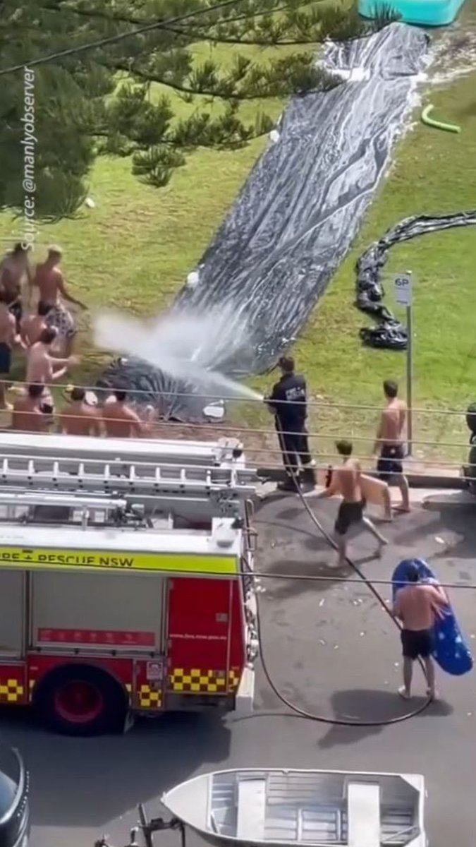 A group of revellers celebrating Australia Day with a giant slip 'n slide in Sydney's Northern Beaches got some assistance from the local firies to help give them the ride of their lives! ⁣💦 See how Sydney celebrated >>> 📱Download our app for exclusives:
