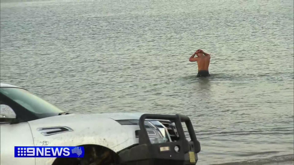 Elwood beachgoers trying to beat the heat were greeted with a bizarre sight this morning - a four-wheel-drive bogged in the sand. #9News