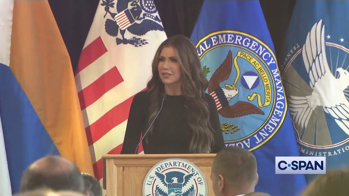 .Secretary Kristi Noem walks to speak to DHS staff to the tune of Trace Adkins "One Hot Mama."