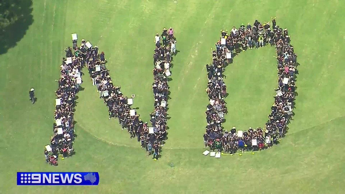 A giant human "NO" has been formed on the site of a new stadium, proposed for the Brisbane 2032 Olympic Games. #9News Ha-Teya Gripske