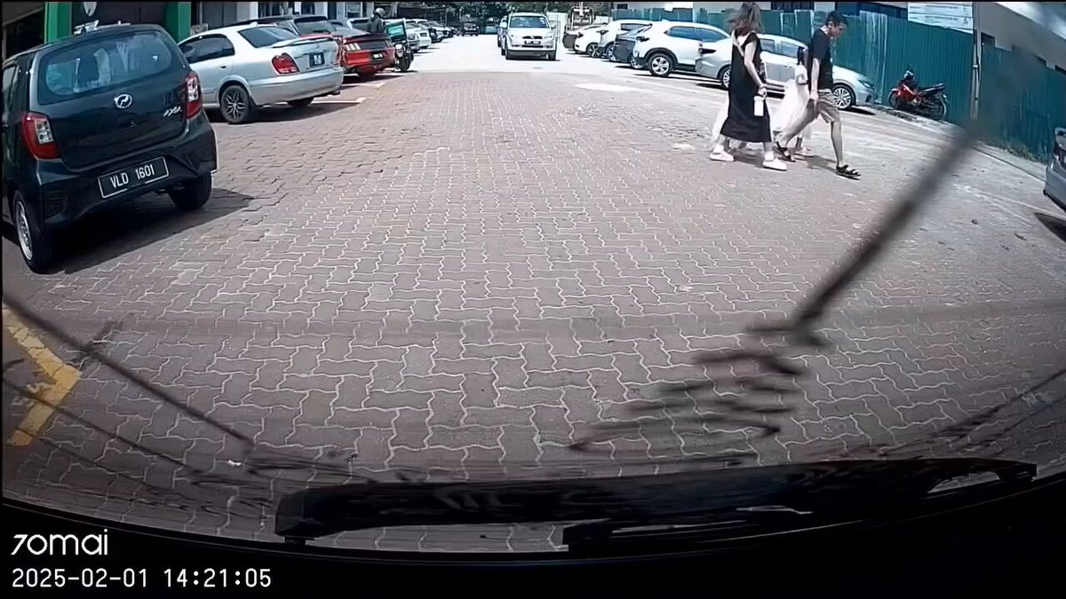 The driver said "This is not your parking spot. Got your name meh?"