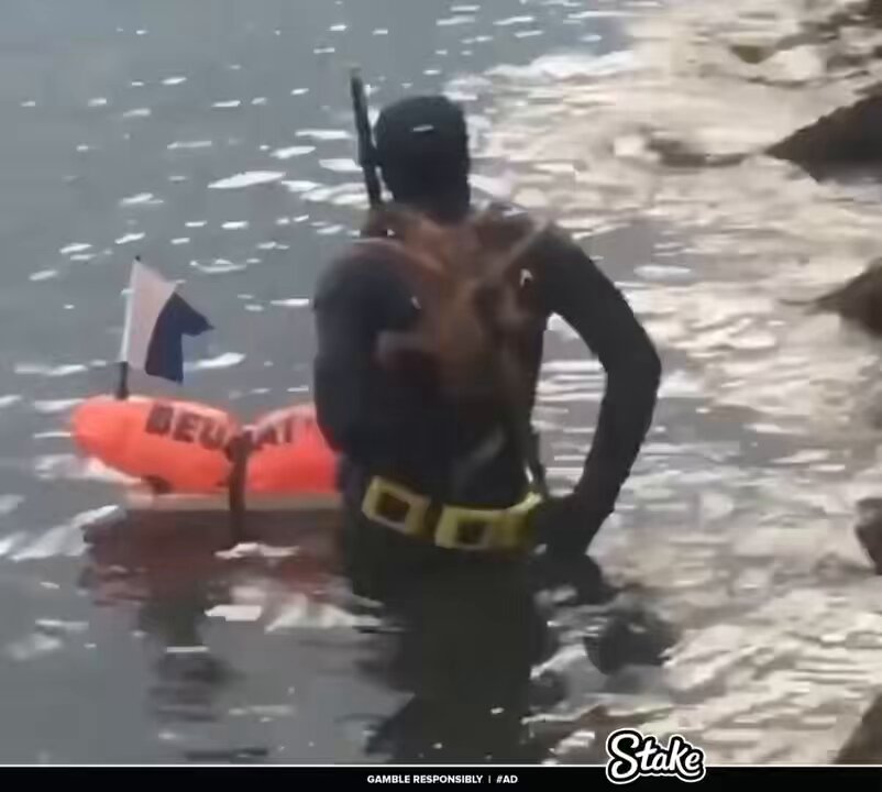 Man has an Octopus stuck on his back