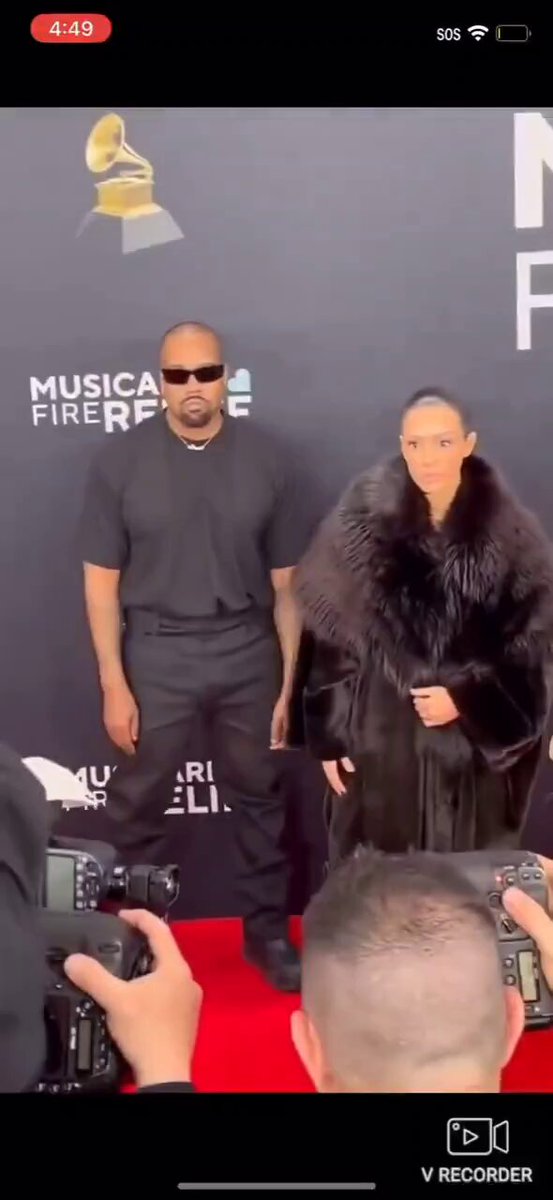 Nude !! This is called transparent attire ... #KanyeWest in full black outfit better half #BiancaCensori in nude dress at #GRAMMYs #GrammyAwards2025