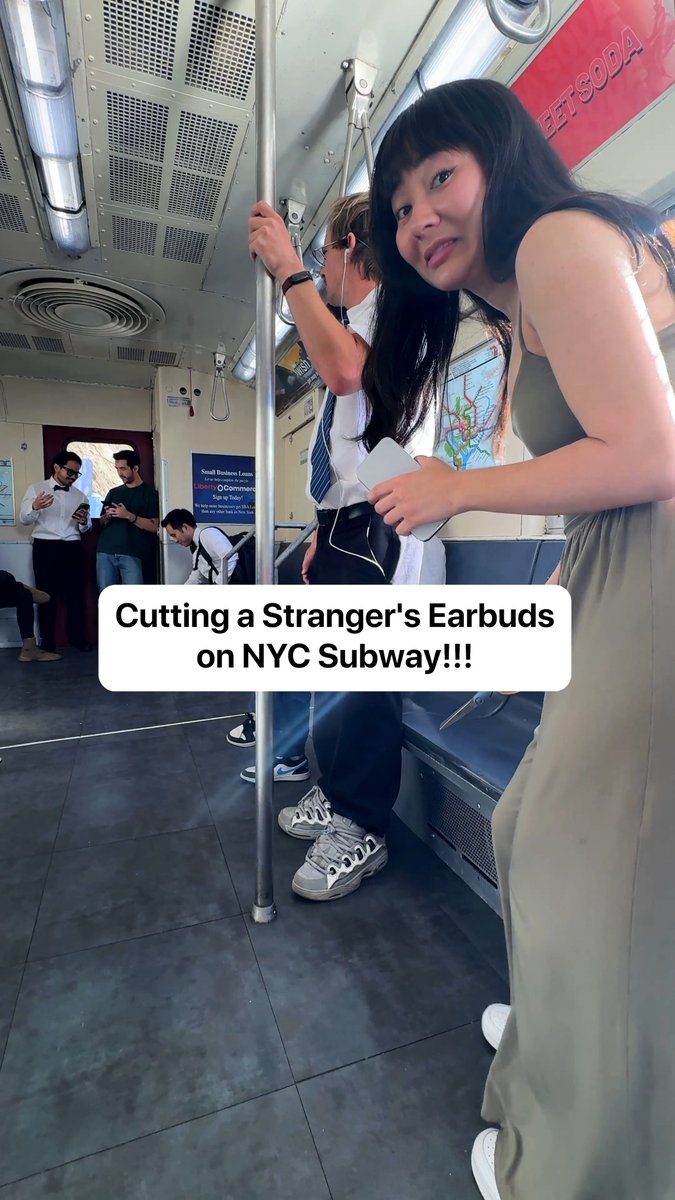 Cutting a stranger's earbuds on an NYC subway ✂️