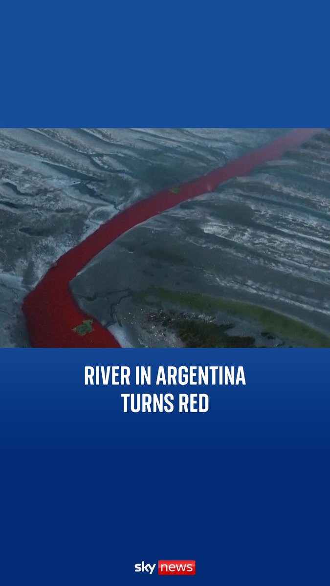 A river on the outskirts of Buenos Aires has turned bright red, sparking fears of contamination.