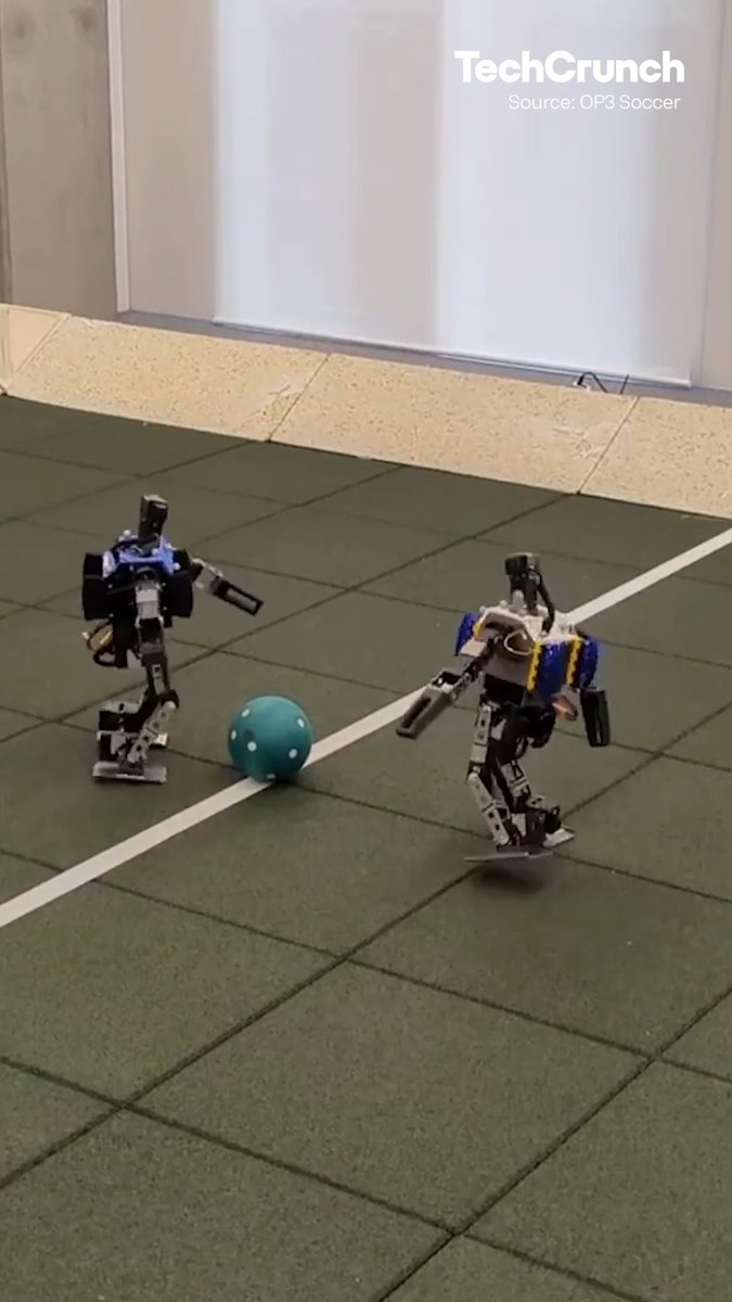 Google DeepMind's OP3 Soccer Team used AI to train tiny bipedal humanoid robots how to play soccer