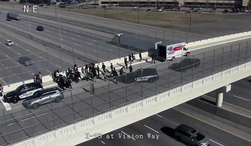A group of Nazis was seen on Friday hanging a banner and flags off the overpass between Evendale and Lincoln Heights. With Lincoln Heights being a historically Black community, the demonstration drew counter-protesters who set fire to one of their flags.