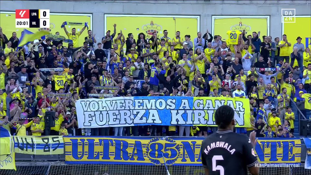 "Volveremos a ganar. Fuerza, Kirian" 💛 Llega el minuto 20, el de su número en la camiseta de la UD Las Palmas, y se para el partido en apoyo a su capitán ✨ Pelos de punta #LALIGAenDAZN ⚽