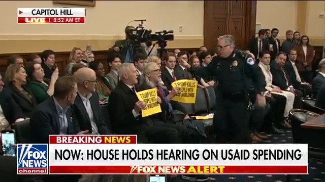 Protesters interrupt a House hearing on USAID spending, demanding that funding be restored to PEPFAR, but "the funding was restored" says Rep. Brian Mast.