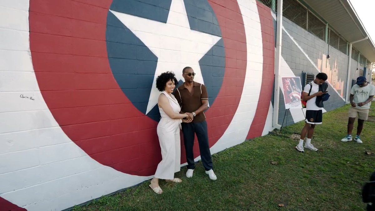 Actor and #Saints fan Anthony Mackie was at his alma mater, Warren Easton High School in New Orleans, to host a charity flag football event and witness the unveiling of a Captain America mural inspired by his role in the film!