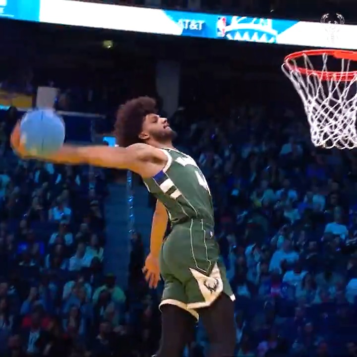 Dre rocks the one-handed windmill for his second dunk.