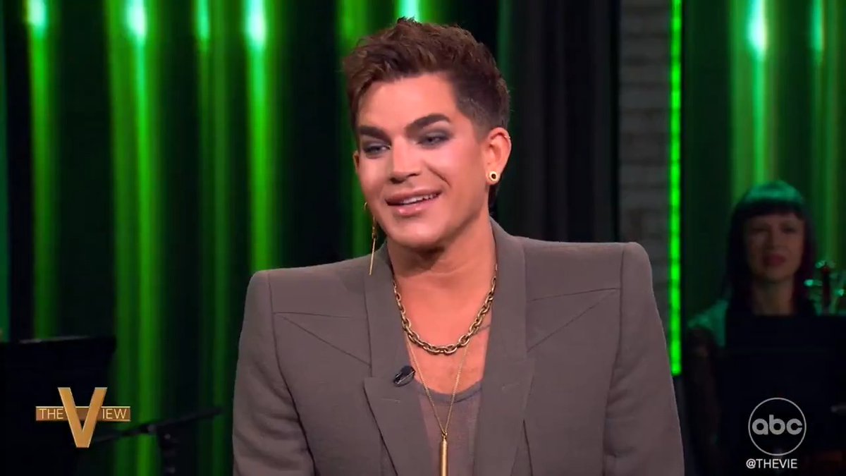 .ADAM LAMBERT tells us about his Broadway debut in 'Cabaret,' shares why the musical continues to be relevant today and his response to an audience member who laughed at an antisemitic line during a performance.