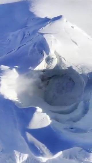 Volcanologists are closely monitoring Mount Spurr in Alaska as a series of small, shallow volcanic earthquakes continue beneath the volcano, indicating ongoing activity. Overflight video from Feb 7, 2025, shows small lake nestled in snowy crater. Courtesy of Alaska AVO / USGS