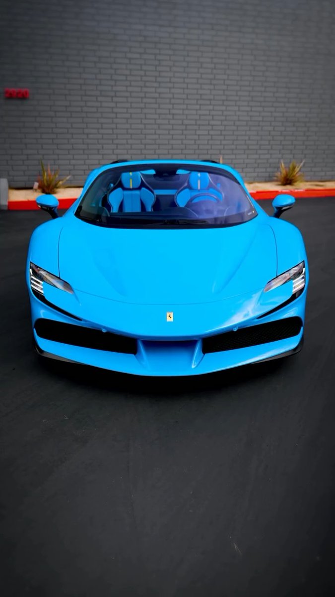 2024 Ferrari SF90 Spider shown in a Special 2-Layer Blu Soltani Exterior over Baby Blue Leather!