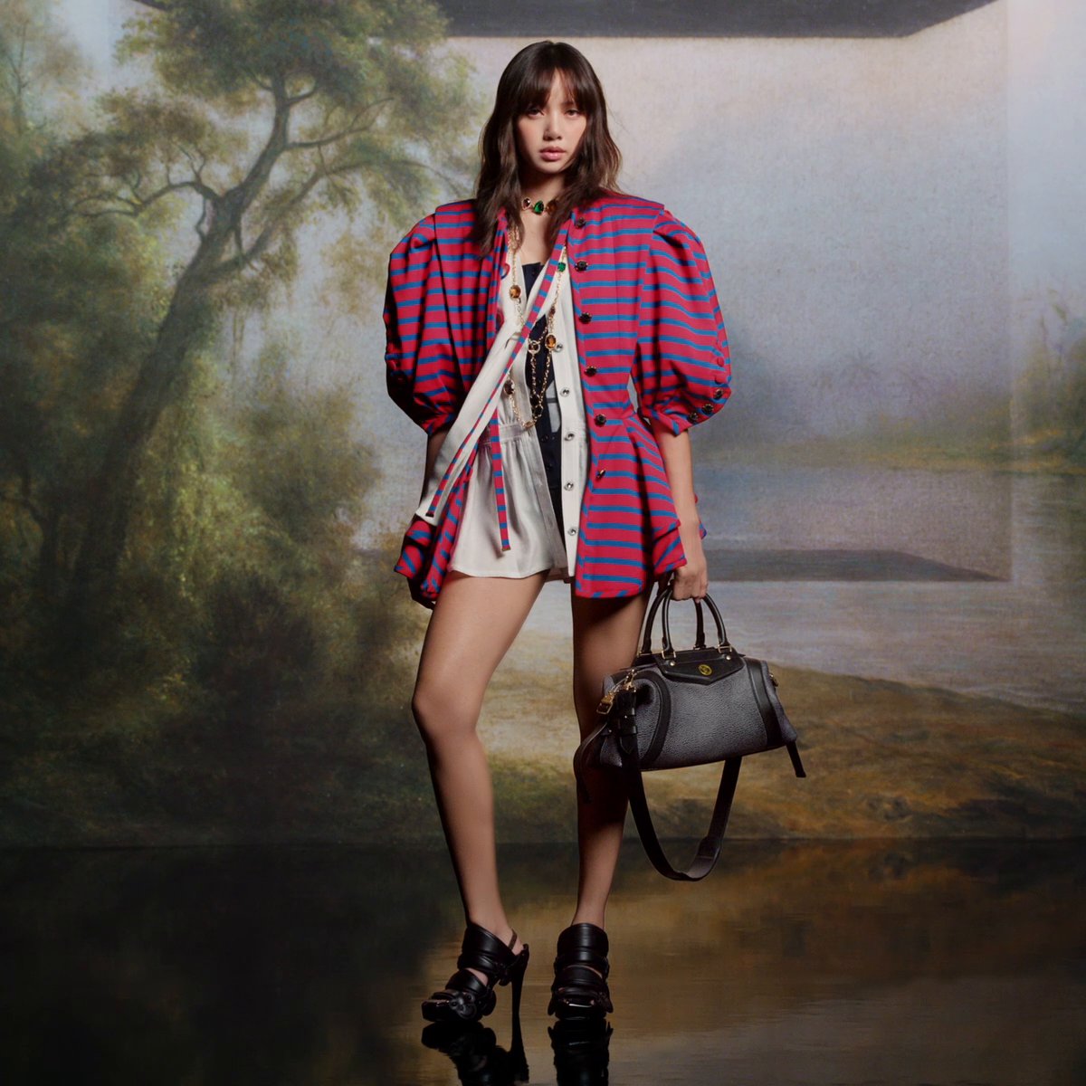 A dialogue of contrasts, heritage nuances meet bold creative audacity in #NicolasGhesquiere’s #LVSS25 Collection, where House Ambassador #Lisa is depicted as a portrait within the paintings by #LaurentGrasso. Discover the creations at #LouisVuitton