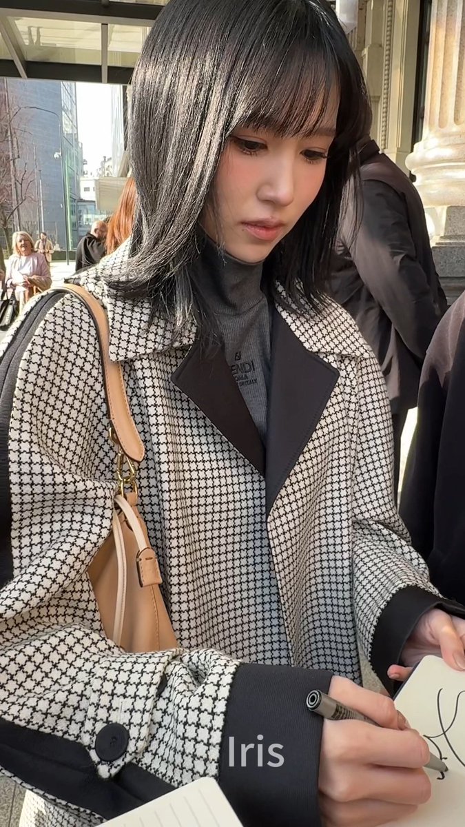 Mina signing for fans in Milan today, she's so effortlessly pretty