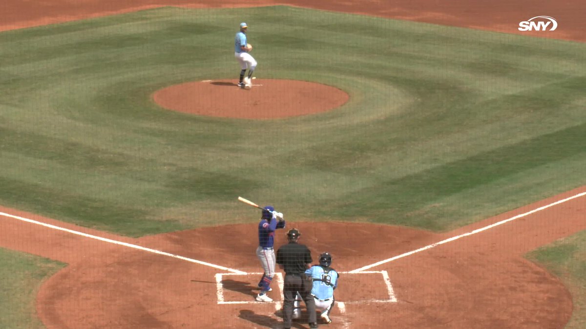Luisangel Acuña being looked at after getting hit by a pitch from Shane McClanahan