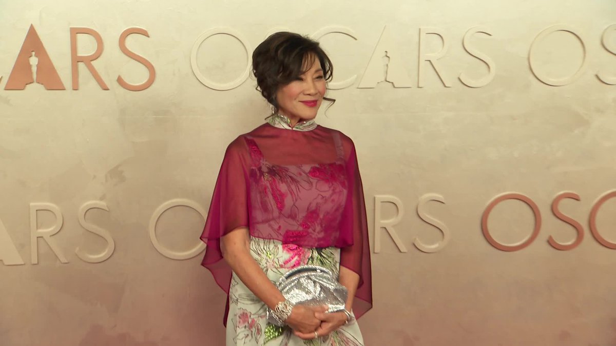 Academy president Janet Yang poses for photos at the #Oscars.