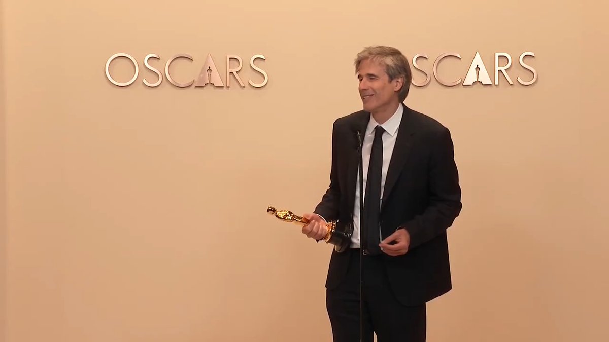 The filmmaker of #ImStillHere shares his pride to win the #Oscar for his home country of Brazil backstage