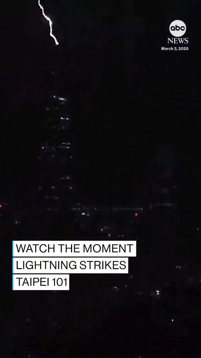 A bolt of lightning strikes the spire of Taipei 101, the tallest building in Taiwan, which stands over 1,600 feet tall.