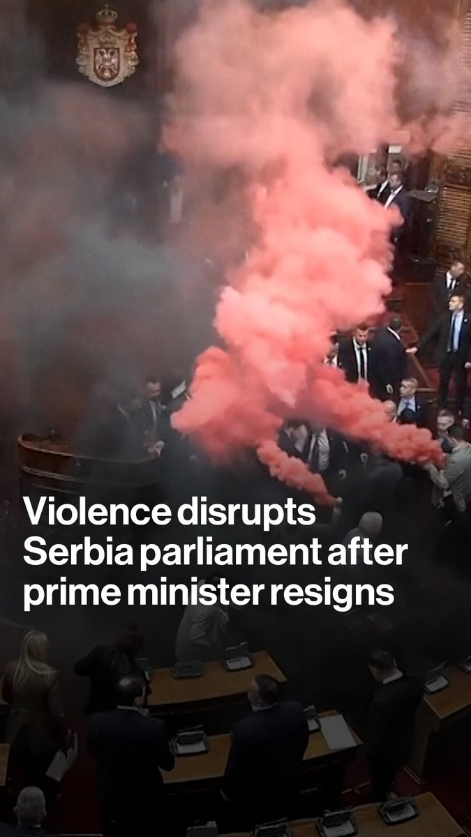 Opposition deputies threw smoke grenades in Serbia's national assembly, disrupting a session confirming the resignation of Prime Minister Milos Vucevic