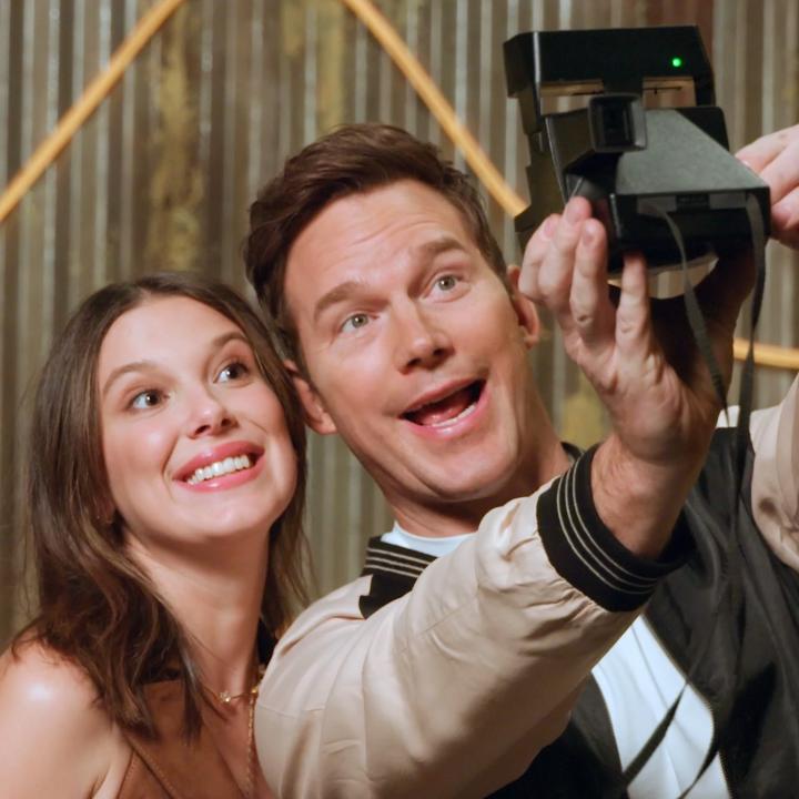Chris Pratt slowly unraveling while Millie Bobby Brown asks questions about '90s tech 💀 The Electric State premieres March 14.