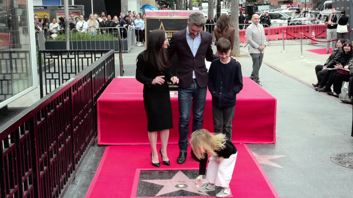 Christina Ricci and her family pose for photos by her newly unveiled star on the Hollywood Walk of Fame.